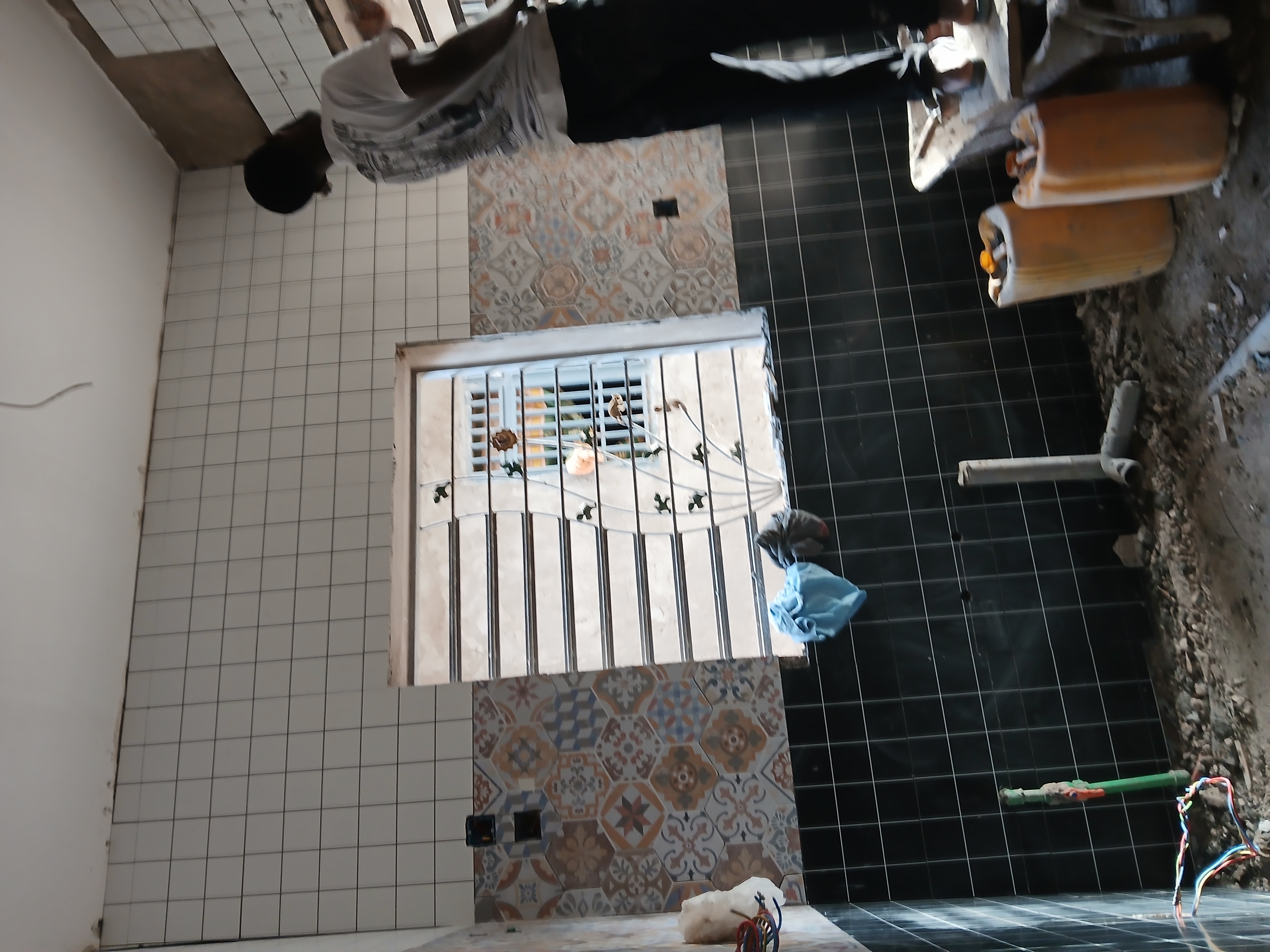 Artisan de Carrelage et Renovation travaillant sur un chantier